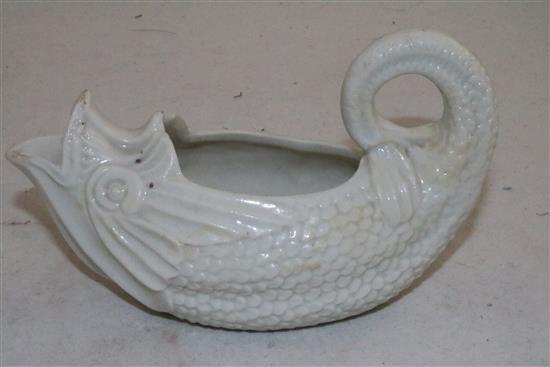 A soft paste porcelain dolphin sauceboat, 18th century, possibly Saint-Cloud or Mennecy, length 14.5cm (5.7in.)